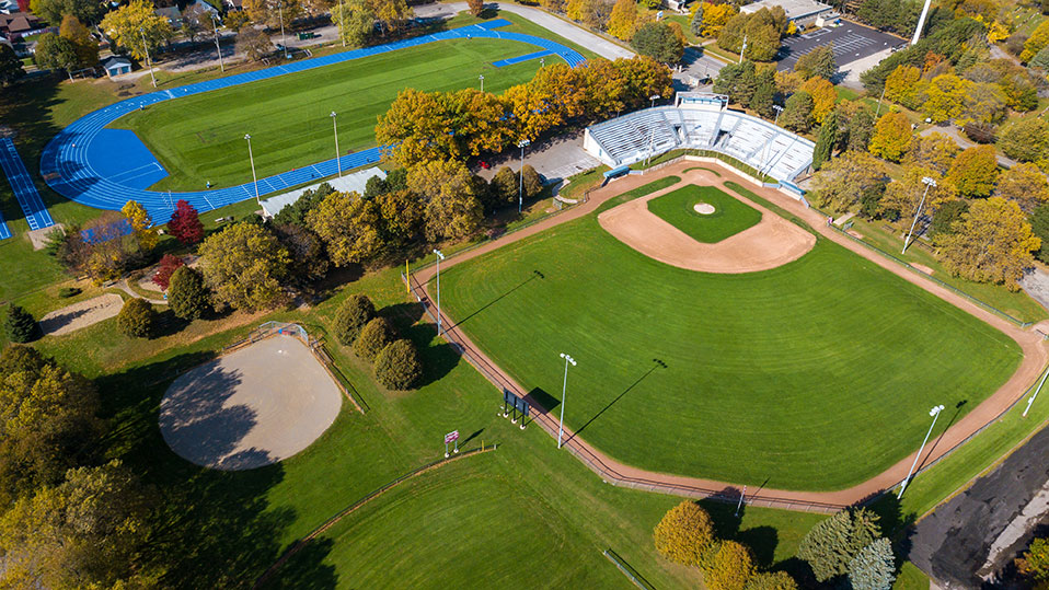 Drone overhead image of Oakes Park showing the baseball field and stands with the walking track in the background.
