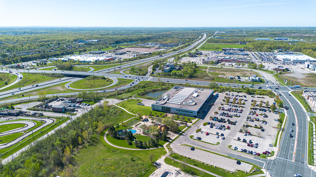 Drone image of MacBain Community Centre showing the facility, outdoor park area, parking lot and stormwater management pond.